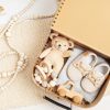Images features gifts for babies in a gift boz featured in article on novamoon Top Baby Christmas Gifts 2024 Top 10 Baby Christmas Gifts 2024: Safe, Fun, and Developmentally Beneficial